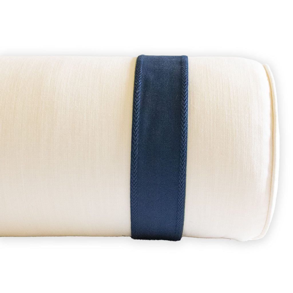 stain resistant ivory performance fabric bolster with inset indigo blue tape trim