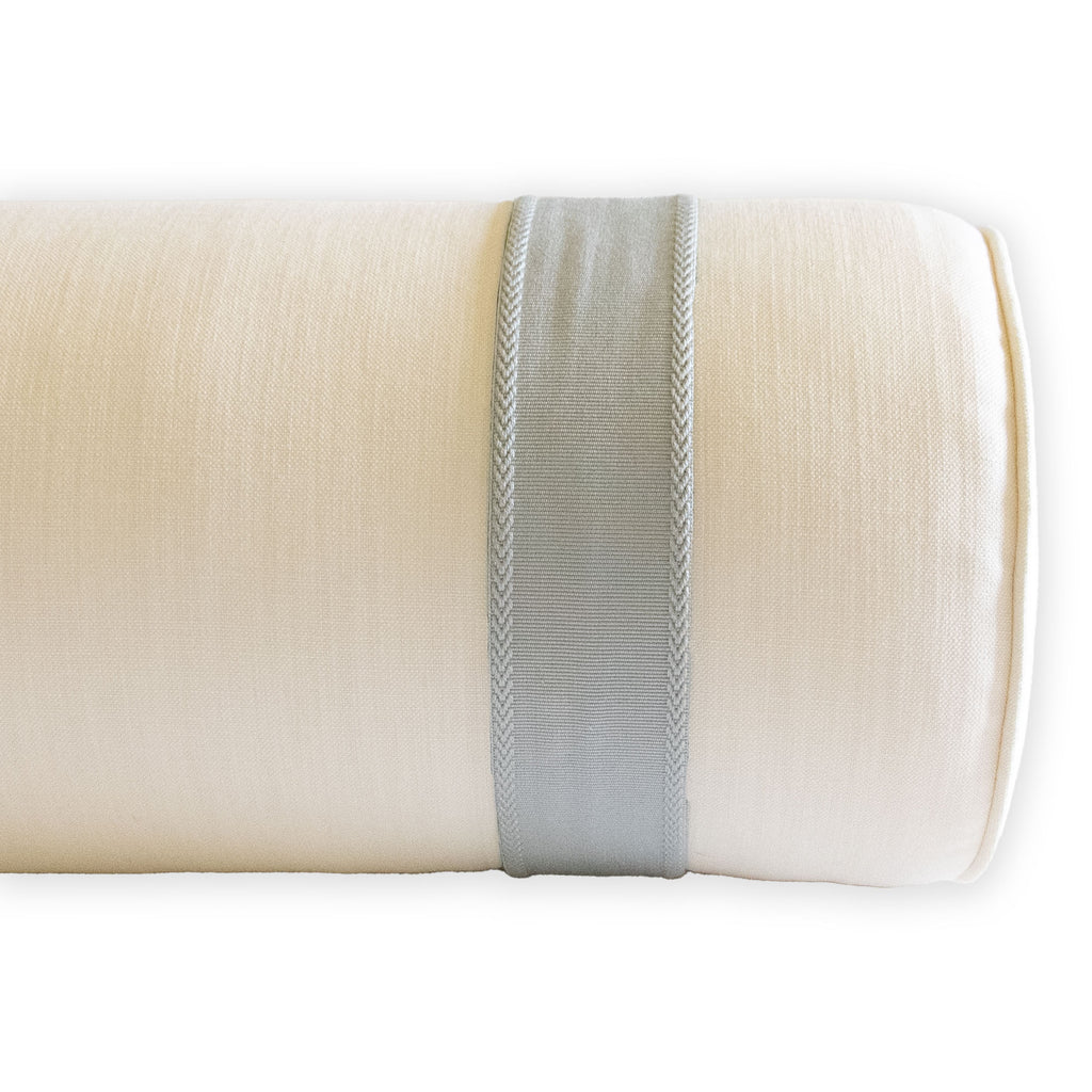 stain resistant ivory performance fabric bolster with inset pale blue tape trim